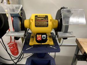 MAKESafe Power Tool Brake, e-stop, and power outage protection installed on bench grinder at Rockefeller University