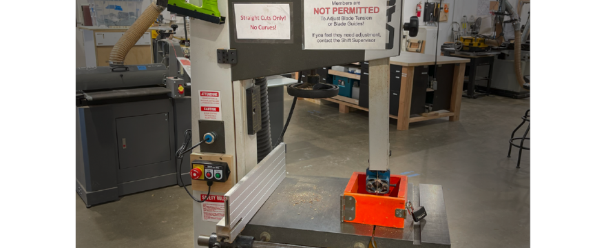 a photo of the front of a Laguna LT 16 band saw with the MAKESafe Power Tool Brake installed and the MAKESafe 3-Button Control visible